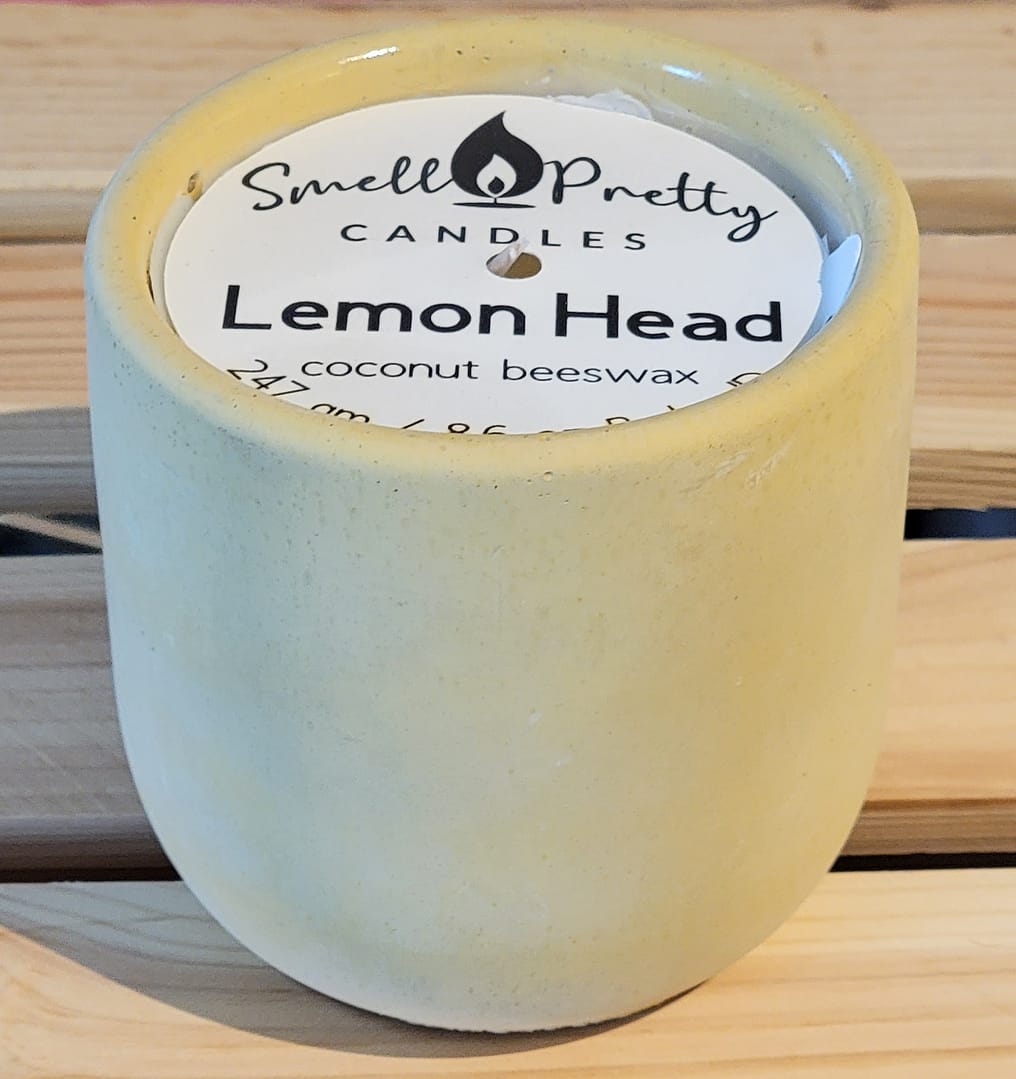 yellow cement candle jar